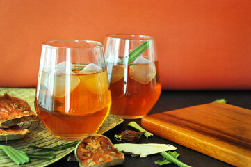 Two Glasses of Thai Dried Bael Tea Aromatic Drinks