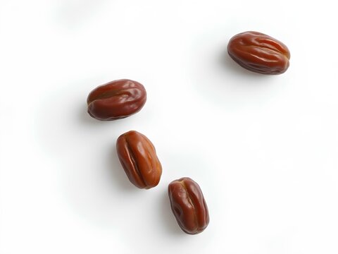 Four fresh, ripe dates (Kurma) beautifully arranged on a clean white background, shot from above. Ideal for healthy eating, Ramadan, or Middle Eastern cuisine themes