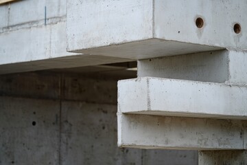 A close-up view of a concrete structure with holes, suitable for use in construction or infrastructure-related contexts