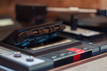 Vintage music player with vinyl and radio creates a retro atmosphere in the world of ancient music.