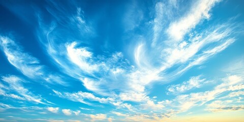 Stunning blue sky featuring a captivating cloudscape, showcasing the vibrant hues of blue alongside the intricate formations of clouds in the sky, creating a picturesque view of the blue sky.