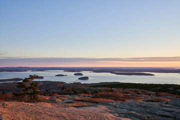 Cadillac mountain has sweeping views of the Atlantic ocean, bar harbor, the porcupine islands, and the Maine coastline. It is a popular place to visit for sunrise, as you can see for miles.