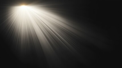 Obraz premium A single beam of light radiates from the center of a flat black background, casting a warm glow with subtle texture and dramatic contrast.