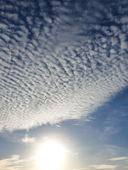 Photo of white clouds with blue sky. The weather is very sunny.