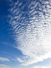 Photo of white clouds with blue sky. The weather is very sunny.