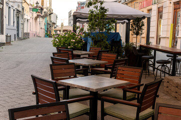 cozy outdoor cafe in Novi Sad, Serbia, on a sunny morning
