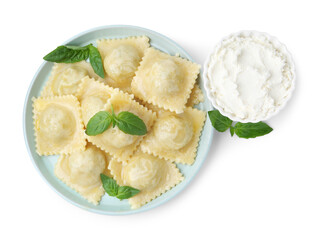 Delicious ravioli with cheese and basil isolated on white, top view