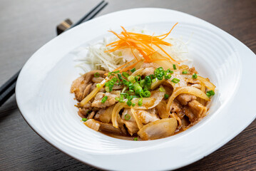 Stir-fried pork with ginger and scallions