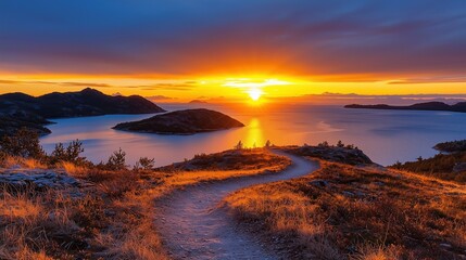 A winding trail leading to a lakeside view under golden dusk light