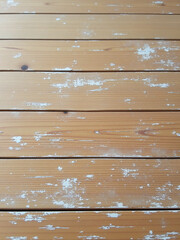 A Worn Wooden Desk Has A Subtle White Paint Splattered Textured Pattern With Visible Cracks In The Surface. 00002