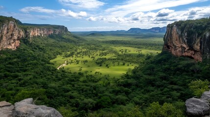Obraz premium Expansive Scenic View of Dramatic Cliff Valley under Cloudy Sky : Generative AI
