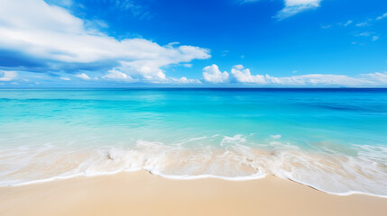 Obraz premium Clean turquoise sea with wave bubbles on sand and beach under blue sky little white cloud on summer vacation holiday