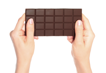 Woman hand holds a chocolate bar, isolated on transparent background, sweet food concept