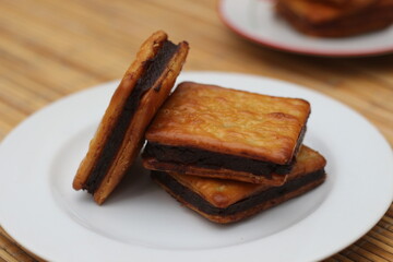 Delicious Chocolate-Filled Crackers on a White Plate