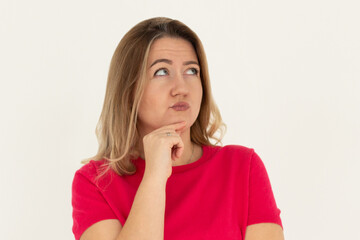 Closeup photo of amazing lady looking up empty space deep thinking creative person arm on chin wear casual red t-shirt isolated white color background