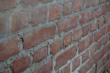 Abandoned rustic brick layered wall surface, Grungy red brick wall texture background, Old rustic colored wall backdrop