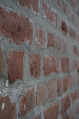 Abandoned rustic brick layered wall surface, Grungy red brick wall texture background, Old rustic colored wall backdrop