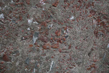 Damaged cement concrete wall texture background, rusty uneven cement wall surface, Grungy abstract wall backdrop