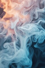 Obraz premium Colorful smoke swirls create an abstract pattern on a dark background in a mesmerizing display of orange and blue hues