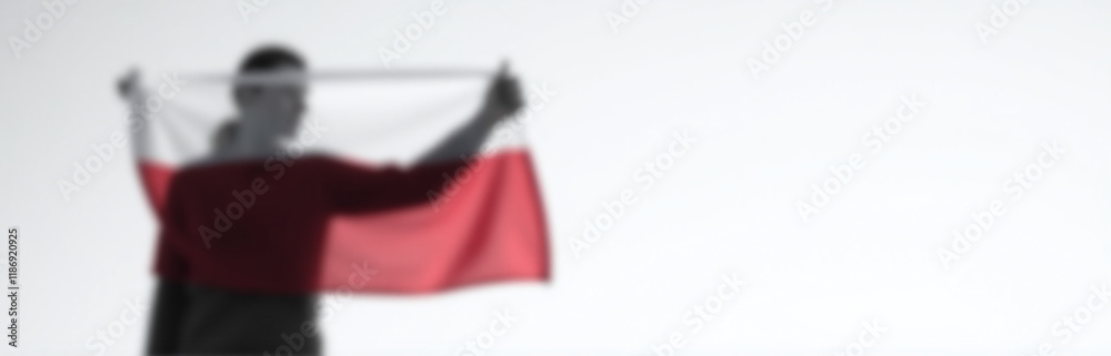 Poster a person in black and white is holding a polish flag with space around them for copy purposes elsewh