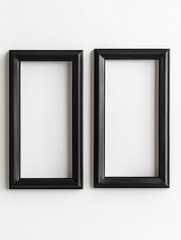 Two Black Picture Frames on White Wall