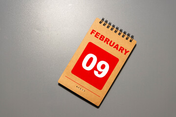 Save the Date written on a calendar - February 09
