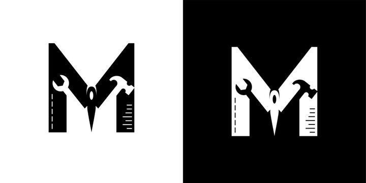 logo design letter M with negative tools