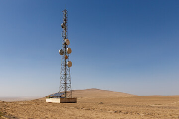 Communication tower stands tall in the vast landscape of Kunduz Province, Afghanistan