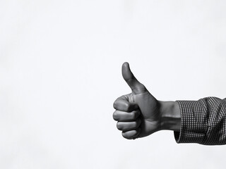 A Hand Gives A Thumbs Up With A Good Sign In Black And White On A Textured Paper Background, Copy Space. 00003