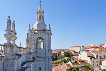 Bell tower of Monastery of Sao Vicente de fora and skyline of Old town of Alfama Lisbon Portugal 