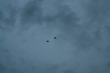 Silhouette of Jets Against a Cloudy Evening Sky, Singapore