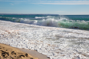 Palma de Mallorca - The big wave and the ship in background.