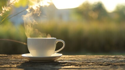 Steaming Hot Coffee Mug with Americano Espresso in Slow Motion Outdoor Table Nature Setting Serene Environment Concept