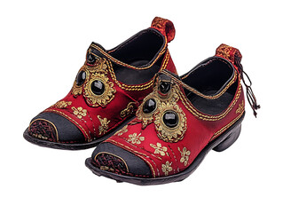 Indoor display of heritage style red embroidered shoes as fashion accessories