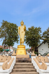 The iconic standing Buddha in Wat Phra That Khao Noi, one of the most tourist attraction destination places in Nan province, Northern of Thailand