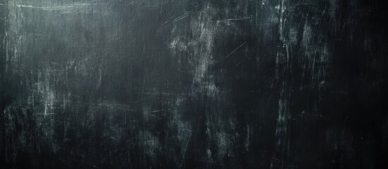 Obraz premium Abstract dark textured wallpaper with black background for design and blank space for text insertion in modern layouts