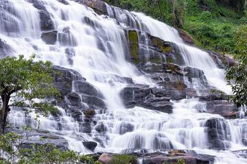 Landscape nature of Mae ya waterfall in mountain Chiang mai Thailand located within the area of Doi Inthanon National Park, a popular destination of tourist in Northern of Thailand