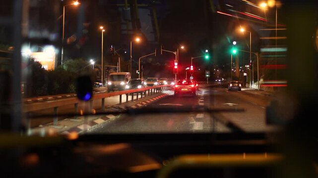 night road in the city. view from the bus window of the night city and road.  public transport.