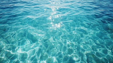 Obraz premium Turquoise Sea Water Aerial View with Sunlight Reflections Ideal for Travel and Nature Backgrounds