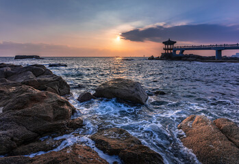 Beautiful sea sunrise and Korean traditional building Yeonggeumjeong scenery. Sokcho-si, Gangwon-do, Korea. (Yeonggeumjeong, translation)