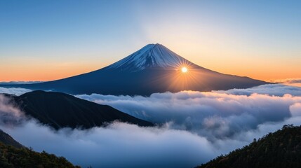 A majestic mountain peak piercing through a thick layer of clouds, its summit illuminated by the sun, conveying a sense of awe and grandeur.