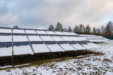 Snow covering solar panels in winter reducing energy production
