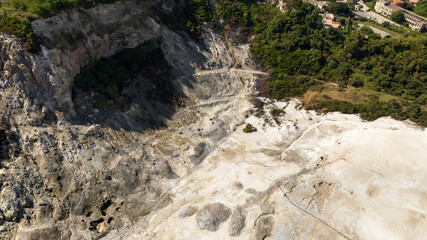 Aerial view of Solfatara in Pozzuoli, near Naples, Italy. It is a shallow volcanic crater part of the Phlegraean Fields volcanic area. It is a sleeping volcano. 