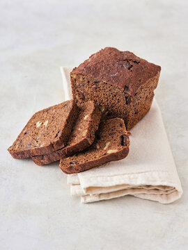 Delicious Modern Bread Loaf Sliced and Served on a Cloth Napkin for a Fresh Dining Experience