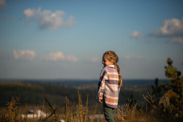 girl looking at the mountains