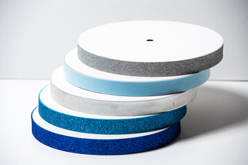 Glitter ribbons in different colors stacked together. Perfect for crafting, gift wrapping, or decoration projects