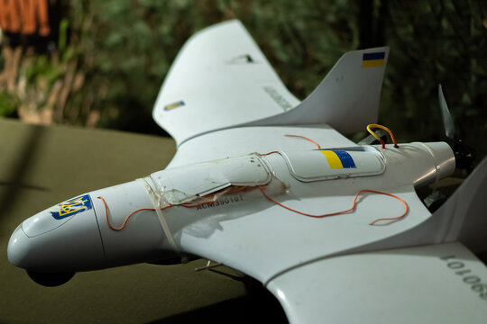 War in Ukraine.Advanced drone technology on display showcasing its unique design and Ukrainian flag representation - Powered by Adobe