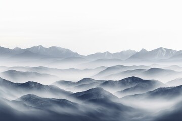 Serene mountain landscape shrouded in mist during early morning hours capturing nature's tranquil beauty