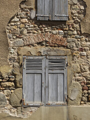 Beautiful traditional window in the historic city of Brioude. Auvergne. France. 