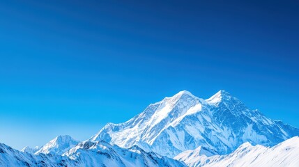 Majestic Snow-Capped Mountain Range Under Brilliant Clear Sky